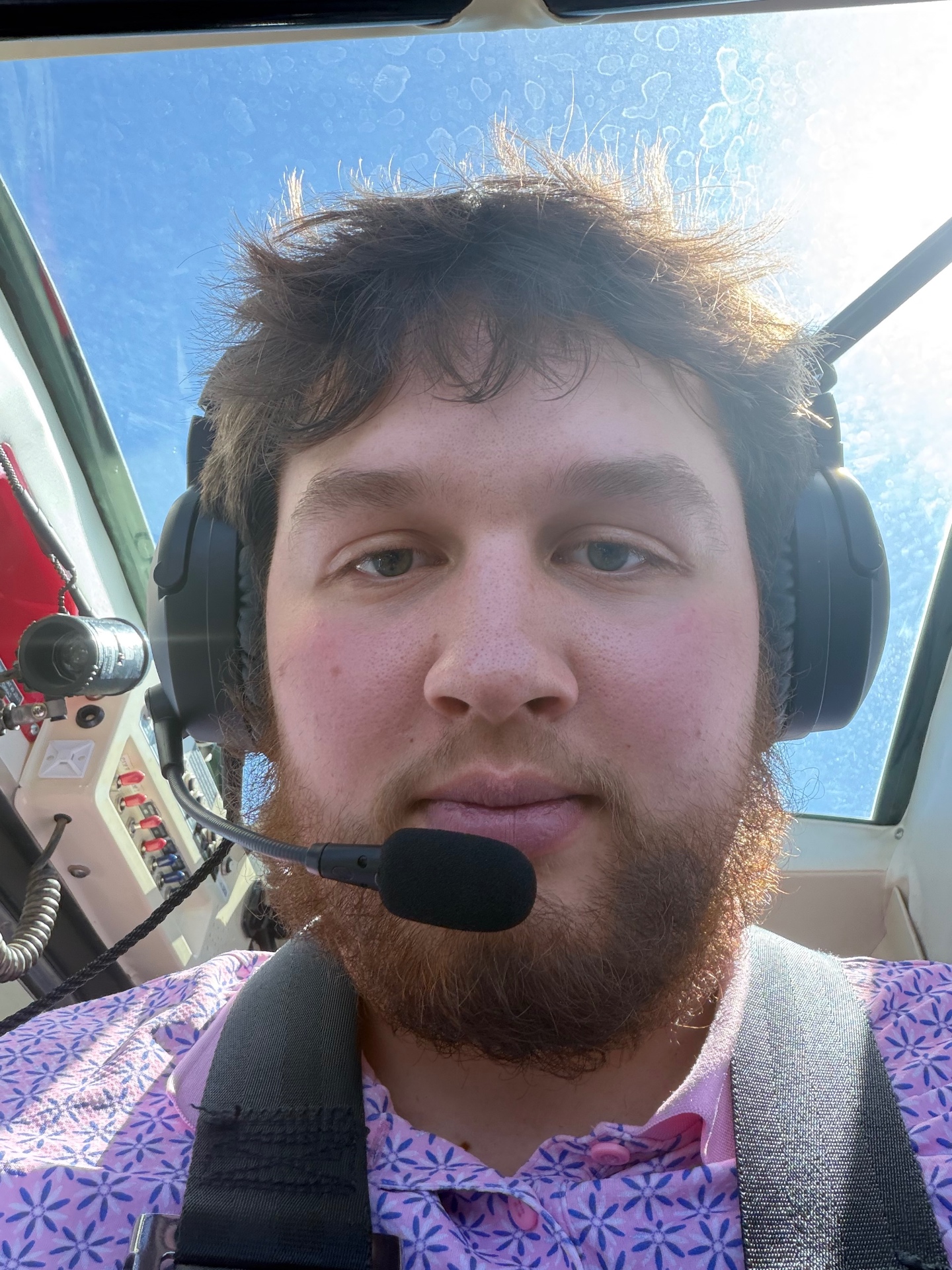 Ian Larrabee, founder of North Ember Travel, in the cockpit